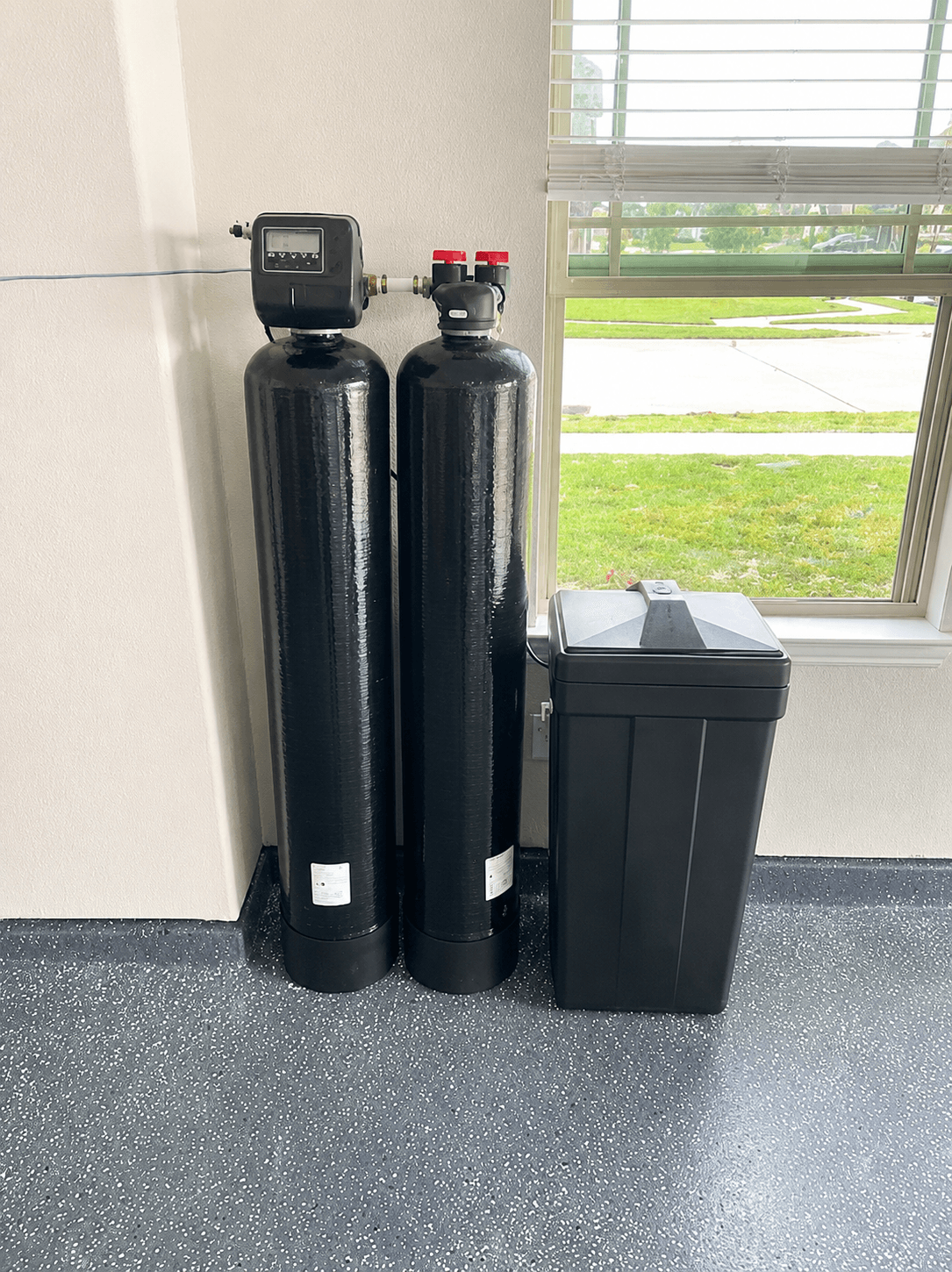Dual-tank carbon and softening system installed in a Parrish home